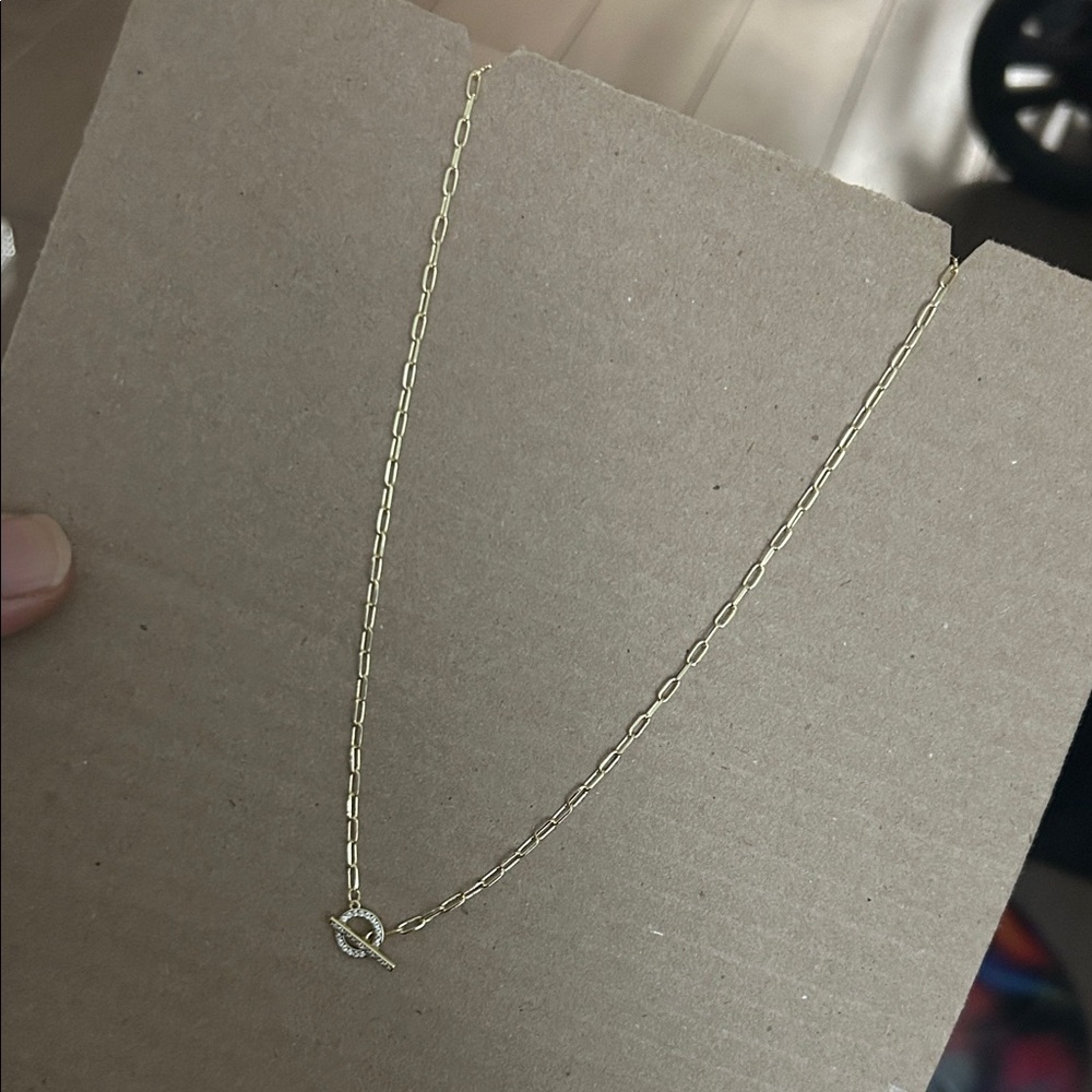 Elegant Gold Necklace with Silver Accent